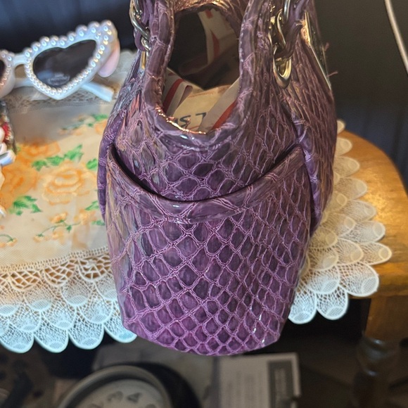 Nicole Miller Crocodile Purple Small Bag ..
Width 10
Length 7 - Picture 5 of 6